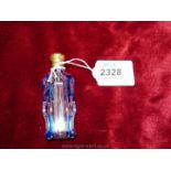 A pretty Victorian Cobalt blue overlaid thumb cut glass scent Bottle with gold coloured metal top,