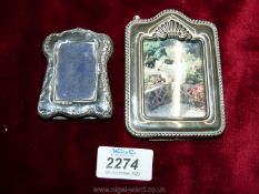A small silver Photograph Frame 1 3/4'' x 1'', a/f and another small plated frame.