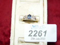 An 18 ct sapphire and diamond ring hallmarked size 'N 1/2'.
