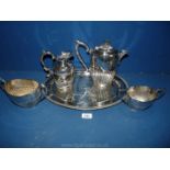 An oval plated serving Tray with coffee pot,