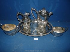 An oval plated serving Tray with coffee pot,