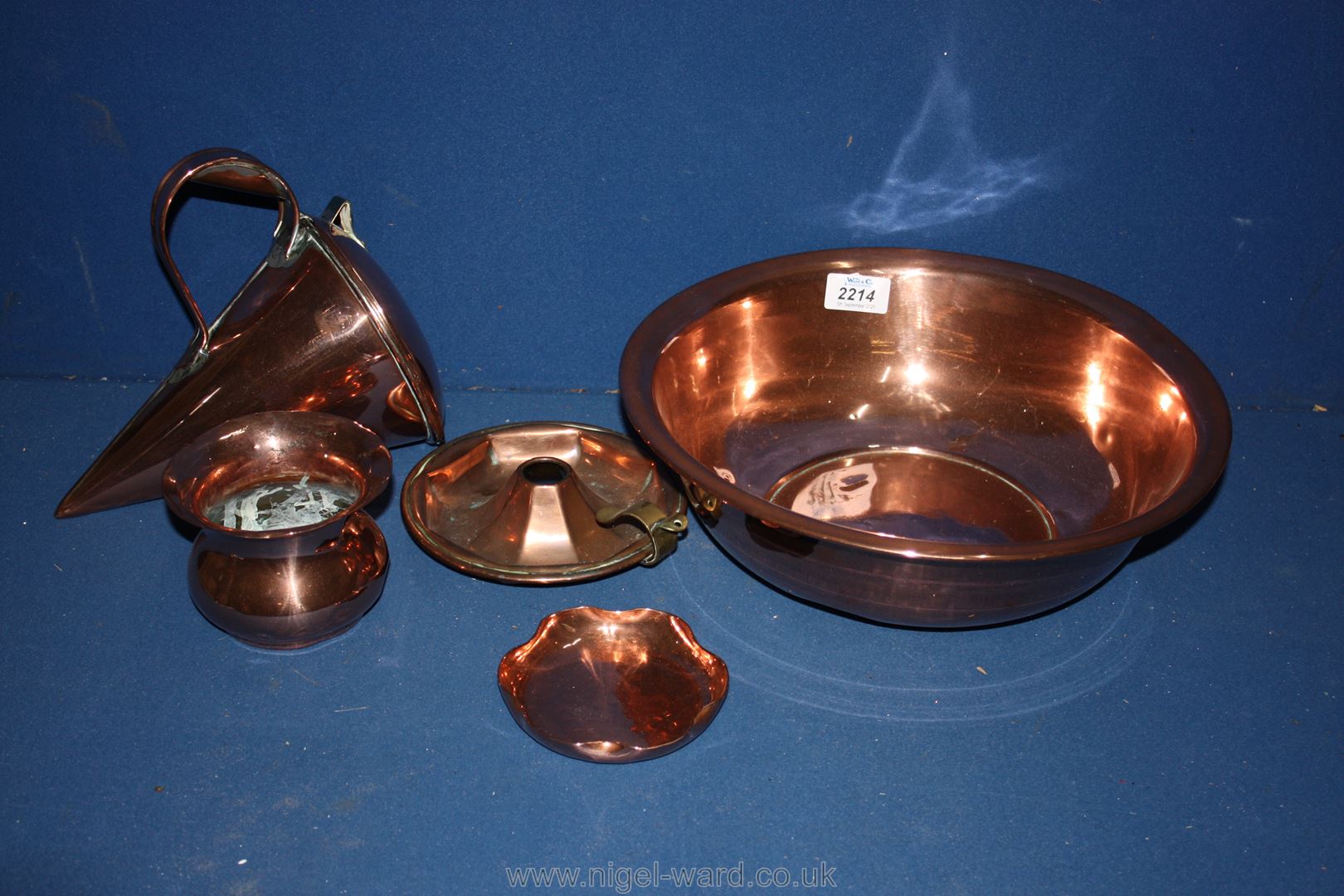 A quantity of copper including bowl (12 1/2'' diameter, 4'' high), a small wavy edged bowl, ashtray,