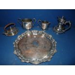 A quantity of silver plate including scalloped edged serving tray with kettle, a coffee pot,