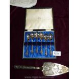 A cased set of six Silver Teaspoons, Birmingham 1931, makers Deykin and Harrison,