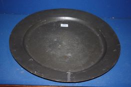 A large, heavy London Pewter Charger, 20" diameter, some rubbed marks to base.