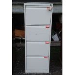 Four drawer filing cabinet with key 52'' high x 18 1/2'' wide x 24 1/2'' deep.