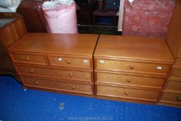 A teak style two over two drawer chest of drawers and a matching set of three drawers.