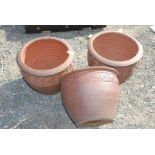 Set of three pottery planters with inscribed detail 10'' high x 12'' diameter