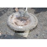 Small concrete style bird bath 10'' high x 15'' diameter with bird figure