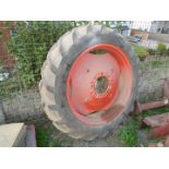 An 8 stud fitting Nuffield tractor rear wheel, tyre and inner tube, believed 12.4 / 11 x 36".