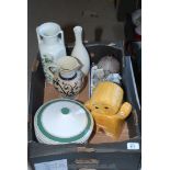 A box of china including vases, jugs, vegetable dishes, gingerbread man cookie jar, etc.