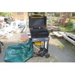 Two tier gas BBQ trolley complete with cover