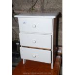 A white painted three drawer Bathroom Cabinet,