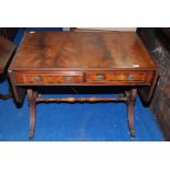 A two drawer drop down leaf table with lyre detailed legs, 5' x 28"x 24".