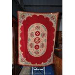 A red Chenile vintage table cloth, 56" wide x 144" long.