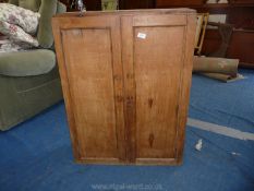 A pine three shelf kitchen cupboard with key, 37" high x 28" wide x 10 1/2" deep.