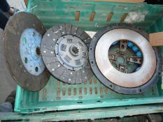 A new/unused Nuffield clutch pressure plate (blue springs) and two clutch plates including one of