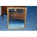 A wooden gilt framed mirror, 21" x 17".