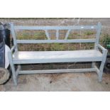 A painted wooden garden bench,