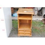 Wooden bedside cabinet with one drawer and pull out table, (top damaged).