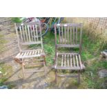 Two wooden garden chairs,