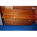 A teak style TV stand.