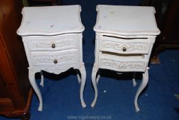 A pair of bedside tables with drawers.