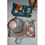Box of various torches and box of copper, pans, platters and water taps.