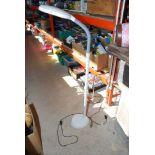 Tall adjustable reading or craft working light.