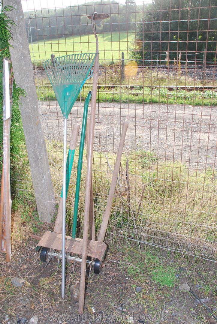 Garden rake, lawn aerator, pickaxe,