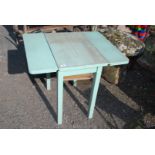 Painted wood drop leaf kitchen table,drawers a/f.