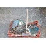 Crate of various bird feeders, hanging baskets,