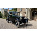 A local restored 87 year old Austin 10 / Ten - Four Saloon Car in black coachwork with green