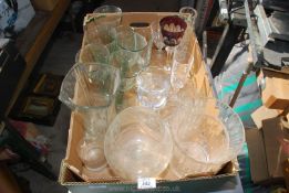 A box of wine glasses, vases, etc.