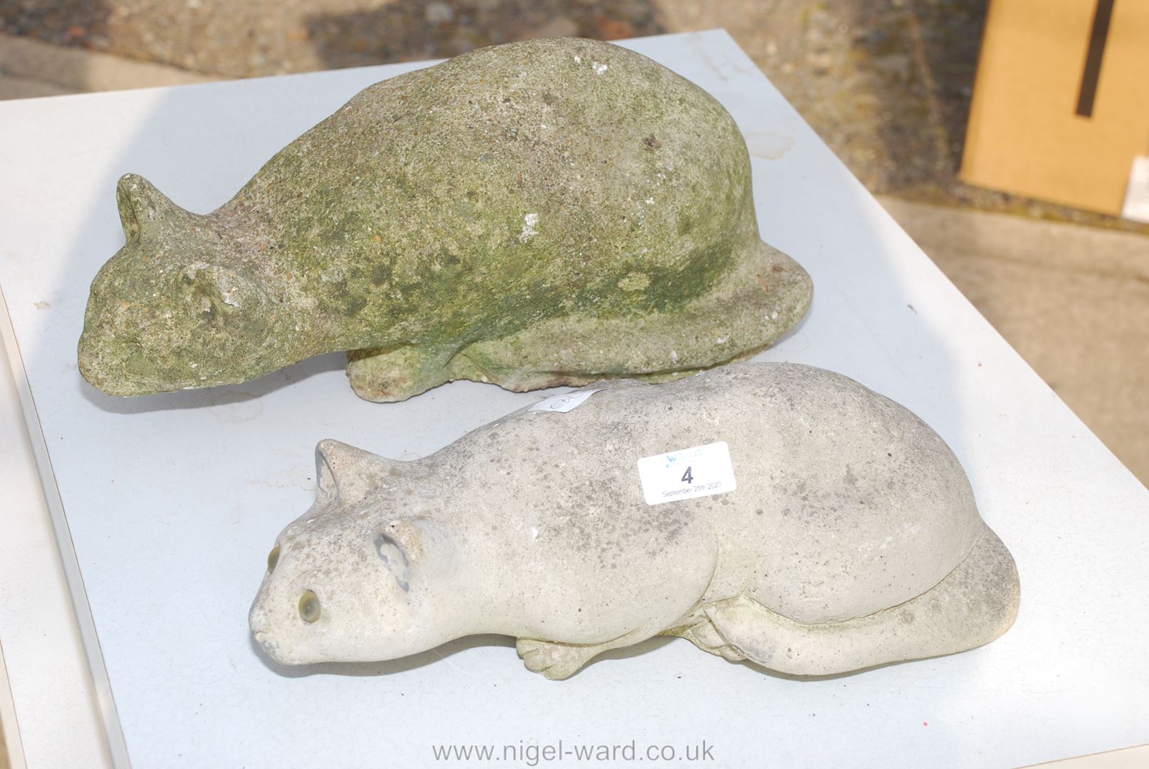 Two concrete style garden cat ornaments