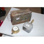 A brass pressure gauge,