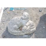 Concrete style garden figure of an Otter with kits