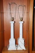 A pair of Corinthian column table lamps, one a/f.