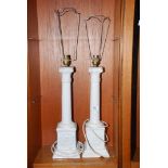 A pair of Corinthian column table lamps, one a/f.