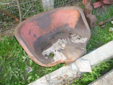 A Nuffield pressed-steel seat pan.