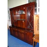 A dark wood lounge display unit with drinks cabinet 71" x 75" x 17" deep.