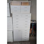 Four piece bedroom suite of two bedside tables, two over four chest of drawers and four drawer unit.