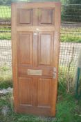 External hardwood door with brass hinges, lock and key,