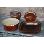 Four stone glazed Cooking pots.
