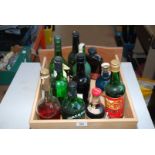 A box of various part opened spirits