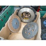 A new/unused Nuffield clutch pressure plate (yellow springs) and two new/unused clutch plates