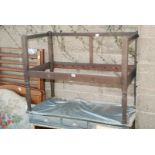 A wooden child's cot frame