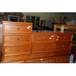 Two, two drawer bedside cabinets with glass top plus a matching three drawer bedroom unit.