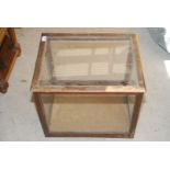 Glass lift top display cabinet (top cracked), 22 1/2" wide x 16 1/2" high x 16 1/2" deep.