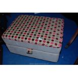 A fabric covered storage box 30" long x 21" wide x 16" high.